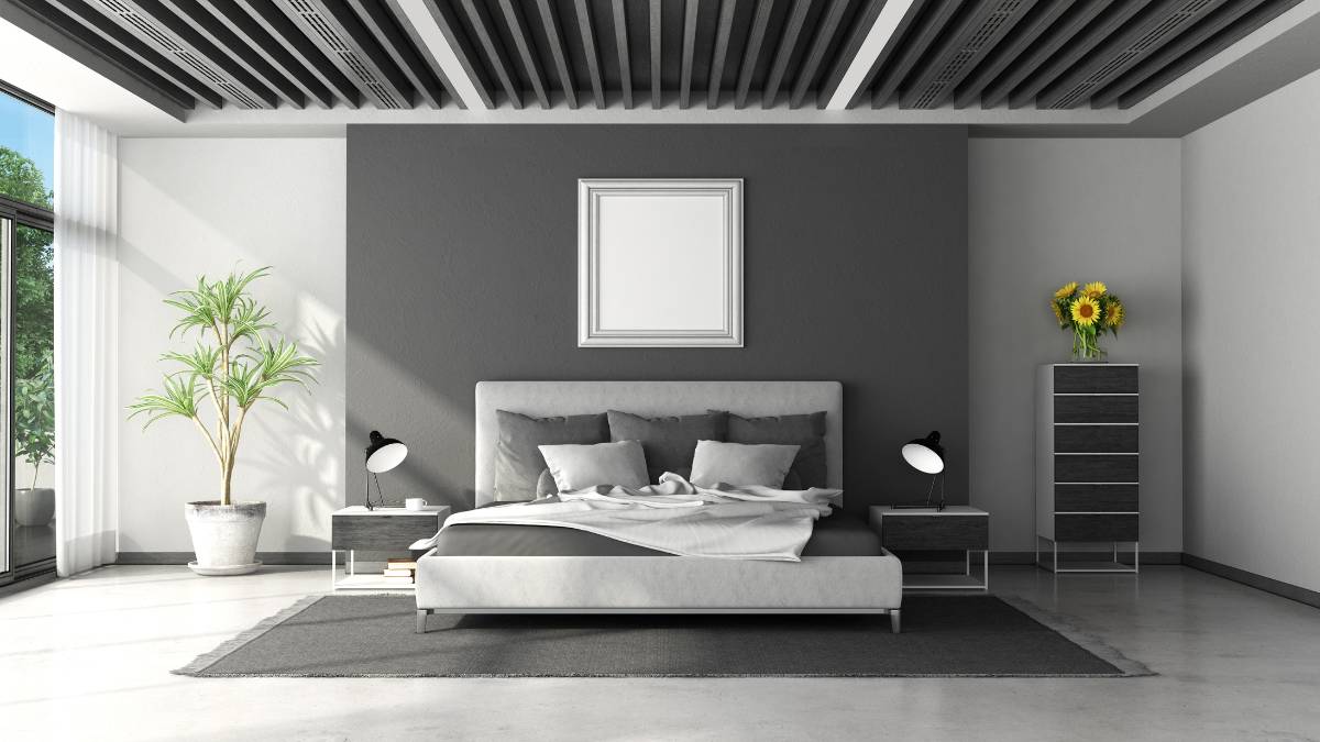 gray themed master bedroom with natural light