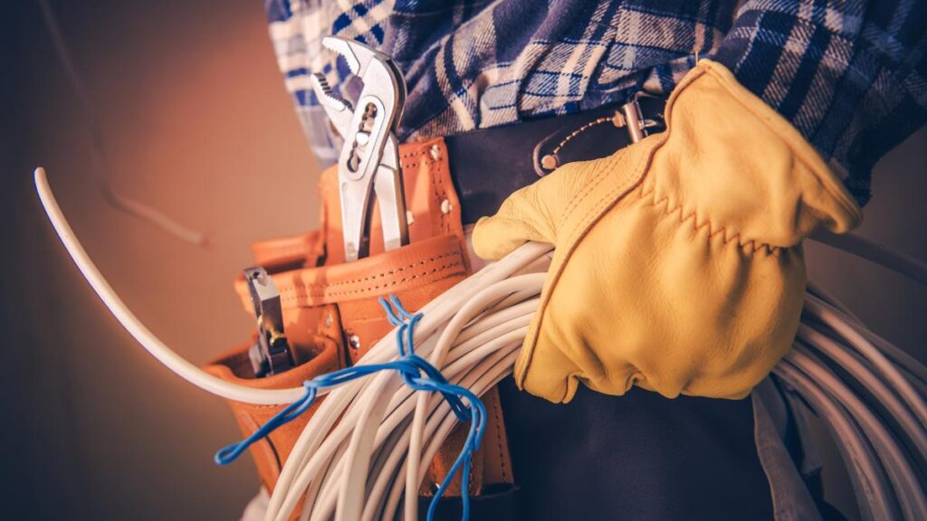 guy carrying electrical remodeling materials