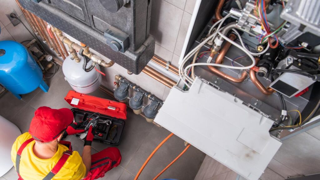 worker doing a heating repair