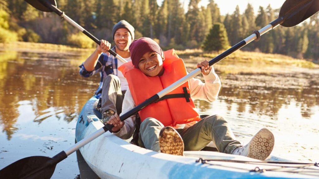 father and son kayaking