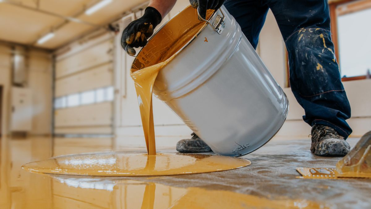 worker doing some floor coating