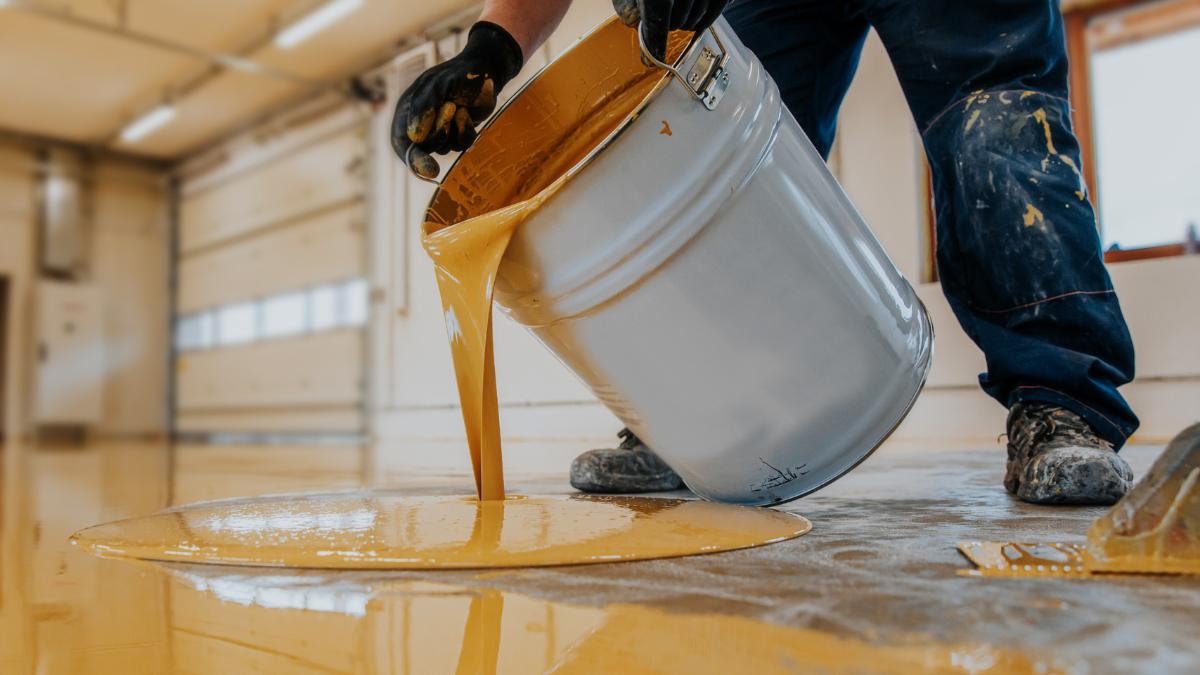 pouring paint in the floor