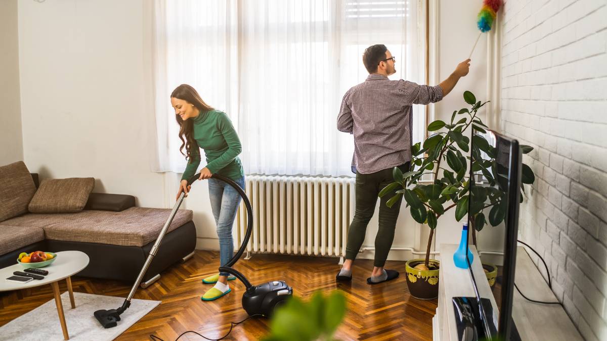 couple cleaning home together