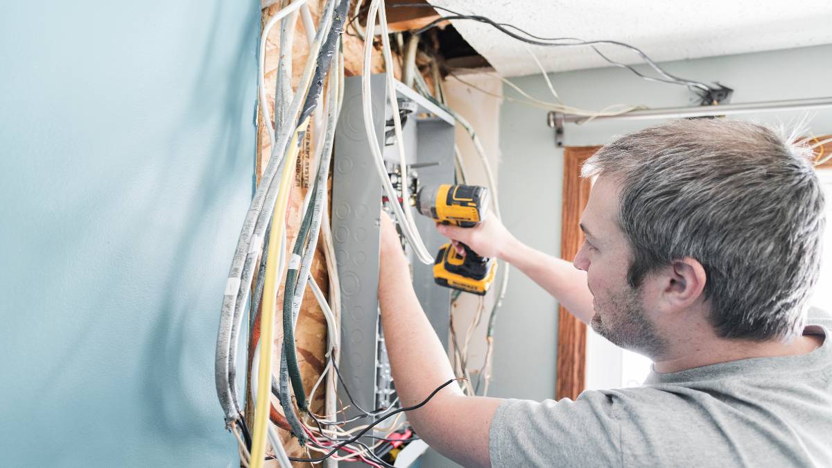 guy working on electrical wirings