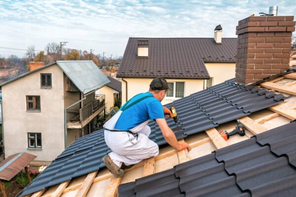 Roofer installing new roof