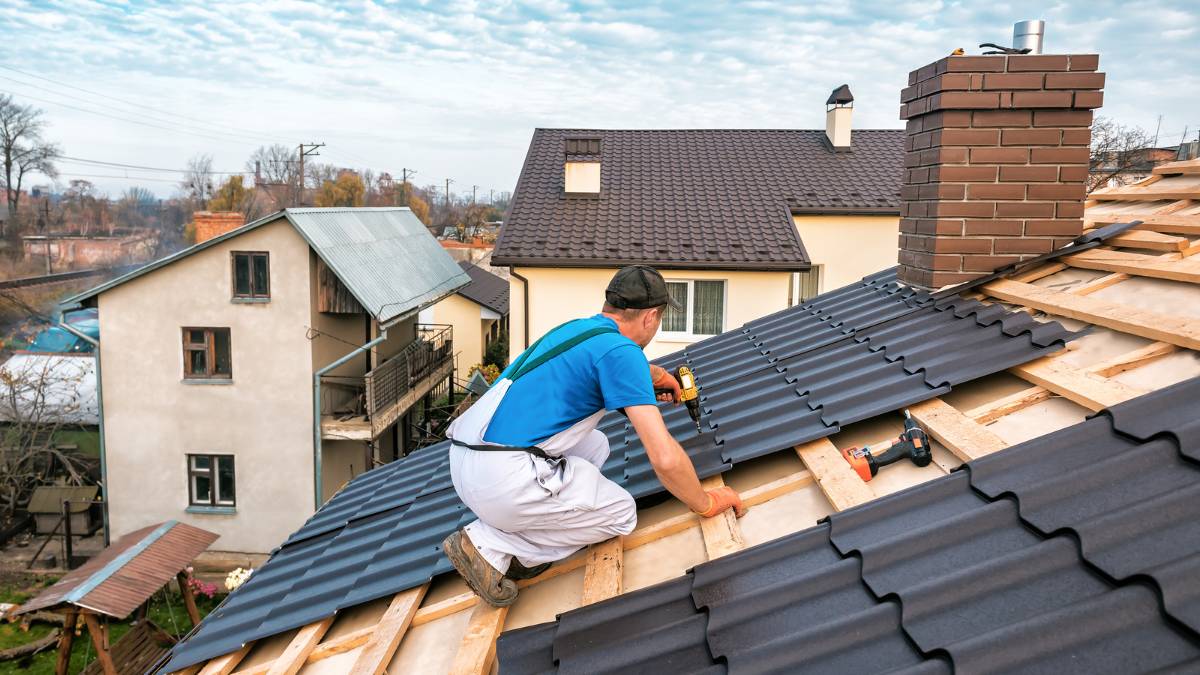 Roofer installing new roof