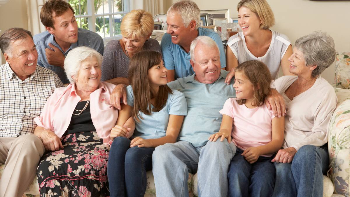 family with grand parents in a living room