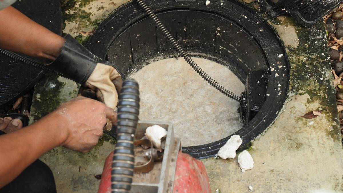 workers cleaning grease