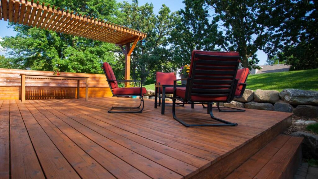 backyard deck with outdoor chairs