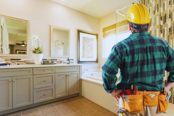 worker checking out bathroom