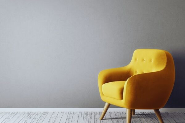 accent chair on a gray wall