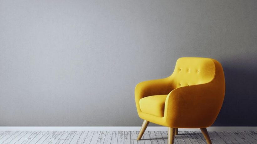 accent chair on a gray wall