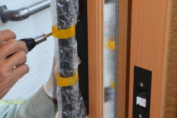 repairman doing a door replacement