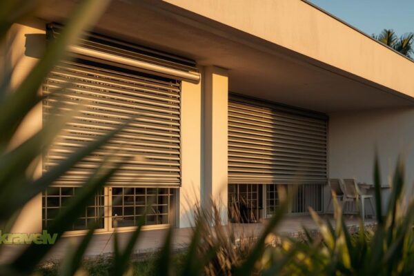 a modern aesthetic vacation home with roll up security shutters on windows.