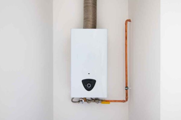 Tankless water heater in a wall
